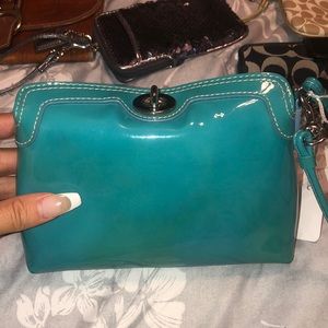 Teal Coach wristlet